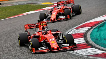 SHANGHAI INTERNATIONAL CIRCUIT, CHINA - APRIL 14: Charles Leclerc, Ferrari SF90, leads Sebastian