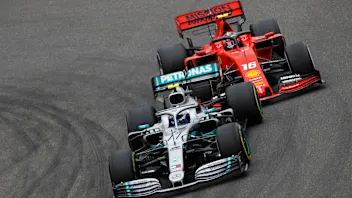 SHANGHAI INTERNATIONAL CIRCUIT, CHINA - APRIL 14: Valtteri Bottas, Mercedes AMG W10, battles with