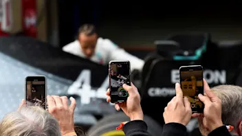 SHANGHAI INTERNATIONAL CIRCUIT, CHINA - APRIL 14: Photos are taken with phones as Lewis Hamilton,