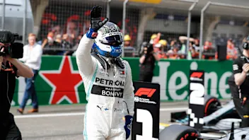 SHANGHAI INTERNATIONAL CIRCUIT, CHINA - APRIL 13: Valtteri Bottas, Mercedes AMG F1 celebrates pole