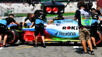HOCKENHEIMRING, GERMANY - JULY 26: Robert Kubica, Williams FW42, in the pits with mechanics during