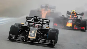 HOCKENHEIMRING, GERMANY - JULY 28: Romain Grosjean, Haas VF-19, leads Pierre Gasly, Red Bull Racing