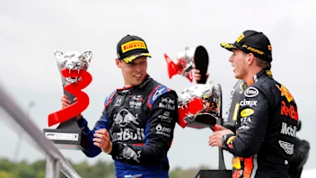 HOCKENHEIMRING, GERMANY - JULY 28: Daniil Kvyat, Toro Rosso, 3rd position, and Max Verstappen, Red