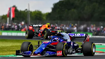 SILVERSTONE, UNITED KINGDOM - JULY 12: Alexander Albon, Toro Rosso STR14, leads Pierre Gasly, Red