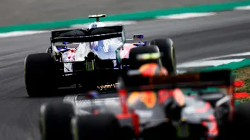 SILVERSTONE, UNITED KINGDOM - JULY 12: Alexander Albon, Toro Rosso STR14, leads Pierre Gasly, Red