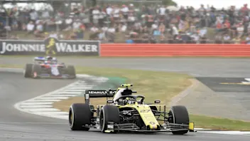 SILVERSTONE, UNITED KINGDOM - JULY 14: Nico Hulkenberg, Renault R.S. 19, leads Daniil Kvyat, Toro