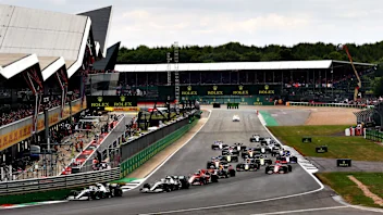 SILVERSTONE, UNITED KINGDOM - JULY 14: Start of the race, Valtteri Bottas, Mercedes AMG F1 leads