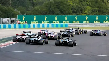 HUNGARORING, HUNGARY - AUGUST 04: Nico Hulkenberg, Renault R.S. 19, leads Alexander Albon, Toro