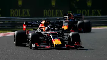 HUNGARORING, HUNGARY - AUGUST 04: Max Verstappen, Red Bull Racing RB15, leads Pierre Gasly, Red