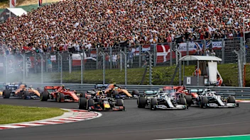 HUNGARORING, HUNGARY - AUGUST 04: Max Verstappen, Red Bull Racing RB15, leads Lewis Hamilton,