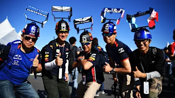 SUZUKA, JAPAN - OCTOBER 13: Red Bull Racing and Scuderia Toro Rosso fans show their support before