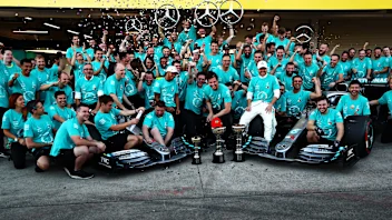 SUZUKA, JAPAN - OCTOBER 13: The Mercedes GP team celebrate winning the constructors championship