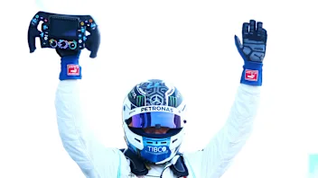 SUZUKA, JAPAN - OCTOBER 13: Race winner Valtteri Bottas of Finland and Mercedes GP celebrates in