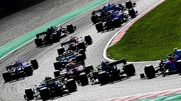 SUZUKA, JAPAN - OCTOBER 13: A general view of the start showing Pierre Gasly of France driving the