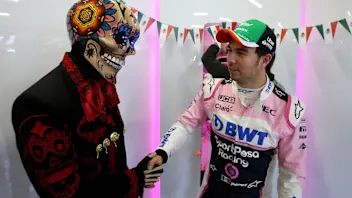 MEXICO CITY, MEXICO - OCTOBER 26: Sergio Perez of Mexico and Racing Point talks with a Mexican