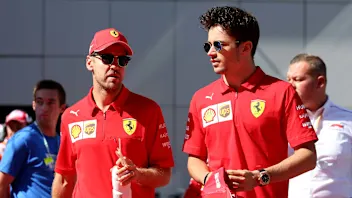 SOCHI, RUSSIA - SEPTEMBER 29: Charles Leclerc of Monaco and Ferrari and Sebastian Vettel of Germany