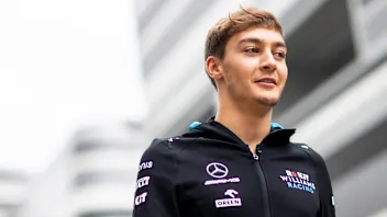 SOCHI, RUSSIA - SEPTEMBER 26: George Russell of Great Britain and Williams walks in the Paddock