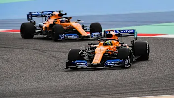 BAHRAIN INTERNATIONAL CIRCUIT, BAHRAIN - APRIL 03: Lando Norris, McLaren MCL34 and Carlos Sainz