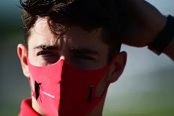 NORTHAMPTON, ENGLAND - AUGUST 07: Charles Leclerc of Monaco and Ferrari looks on before practice