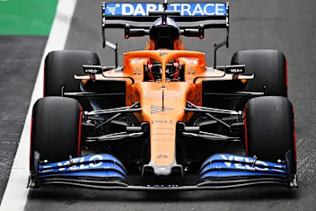 NORTHAMPTON, ENGLAND - AUGUST 07: Carlos Sainz of Spain driving the (55) McLaren F1 Team MCL35