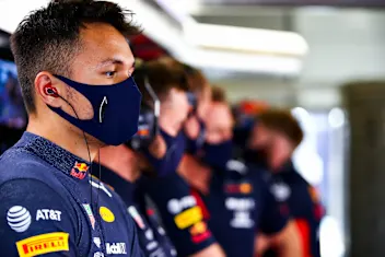 NORTHAMPTON, ENGLAND - AUGUST 08: Alexander Albon of Thailand and Red Bull Racing looks on in the