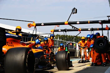 NORTHAMPTON, ENGLAND - AUGUST 09: Carlos Sainz of Spain driving the (55) McLaren F1 Team MCL35