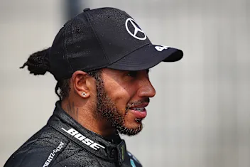 NORTHAMPTON, ENGLAND - AUGUST 09: Second placed Lewis Hamilton of Great Britain and Mercedes GP