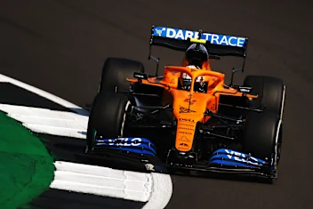 44NORTHAMPTON, ENGLAND - AUGUST 09: Carlos Sainz of Spain driving the (55) McLaren F1 Team MCL35