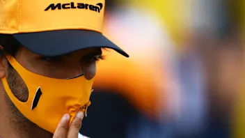 NORTHAMPTON, ENGLAND - AUGUST 06: Carlos Sainz of Spain and McLaren F1 talks to the media in the