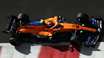 ABU DHABI, UNITED ARAB EMIRATES - DECEMBER 11: Lando Norris of Great Britain driving the (4)
