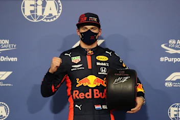 ABU DHABI, UNITED ARAB EMIRATES - DECEMBER 12: Pole position qualifier Max Verstappen of
