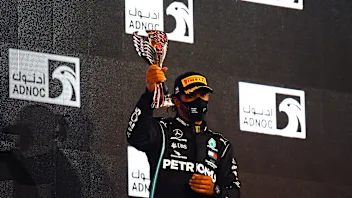 ABU DHABI, UNITED ARAB EMIRATES - DECEMBER 13: Third placed Lewis Hamilton of Great Britain and