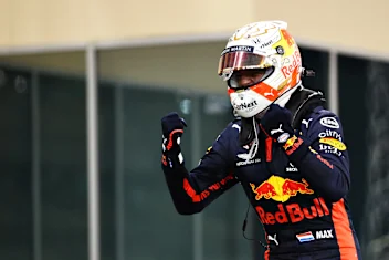ABU DHABI, UNITED ARAB EMIRATES - DECEMBER 13: Race winner Max Verstappen of Netherlands and Red