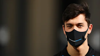 ABU DHABI, UNITED ARAB EMIRATES - DECEMBER 10: Jack Aitken of Great Britain and Williams walks in