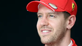 MELBOURNE, AUSTRALIA - MARCH 12: Sebastian Vettel of Germany and Ferrari poses for a photo in the