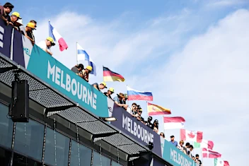 MELBOURNE, AUSTRALIA - MARCH 12: Fans watch over from above the pitlane during previews ahead of