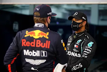 BAHRAIN, BAHRAIN - NOVEMBER 28: Pole position qualifier Lewis Hamilton of Great Britain and