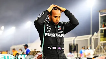 BAHRAIN, BAHRAIN - NOVEMBER 29: Race winner Lewis Hamilton of Great Britain and Mercedes GP