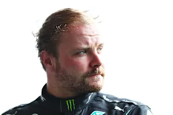 SPA, BELGIUM - AUGUST 30: Second placed Valtteri Bottas of Finland and Mercedes GP looks on in parc