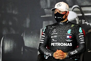 IMOLA, ITALY - OCTOBER 31: Pole position qualifier Valtteri Bottas of Finland and Mercedes GP talks