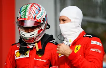 IMOLA, ITALY - NOVEMBER 01: Charles Leclerc of Monaco and Ferrari speaks with teammate Sebastian