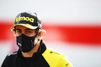IMOLA, ITALY - OCTOBER 30: Fernando Alonso of Spain and Renault Sport F1 looks on in the Paddock