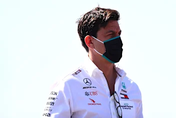 NORTHAMPTON, ENGLAND - JULY 31: Mercedes GP Executive Director Toto Wolff looks on in the Paddock