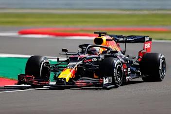 NORTHAMPTON, ENGLAND - JULY 31: Max Verstappen of the Netherlands driving the (33) Aston Martin Red