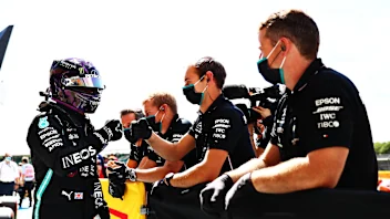 NORTHAMPTON, ENGLAND - AUGUST 01: Pole position qualifier Lewis Hamilton of Great Britain and