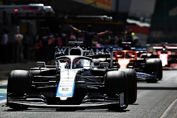 NORTHAMPTON, ENGLAND - AUGUST 01: George Russell of Great Britain driving the (63) Williams Racing