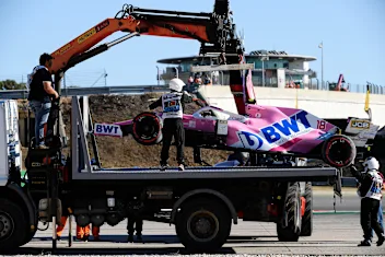 PORTIMAO, PORTUGAL - OCTOBER 23: The car of Lance Stroll of Canada and Racing Point is removed from