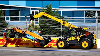 SOCHI, RUSSIA - SEPTEMBER 27: The car of Carlos Sainz of Spain and McLaren F1 is removed from the