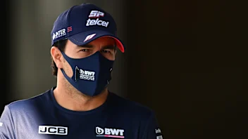 SOCHI, RUSSIA - SEPTEMBER 24: Sergio Perez of Mexico and Racing Point walks in the Paddock during