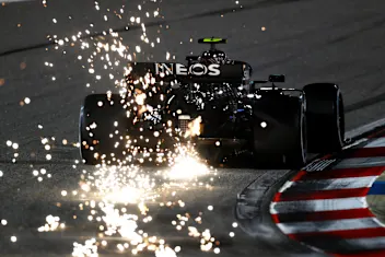 BAHRAIN, BAHRAIN - DECEMBER 04: Sparks fly behind Valtteri Bottas of Finland driving the (77)